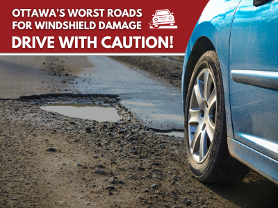 A Car Driving Over a Pothole or Debris